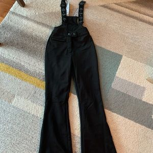 ASOS ski pantsuit bib in black.
